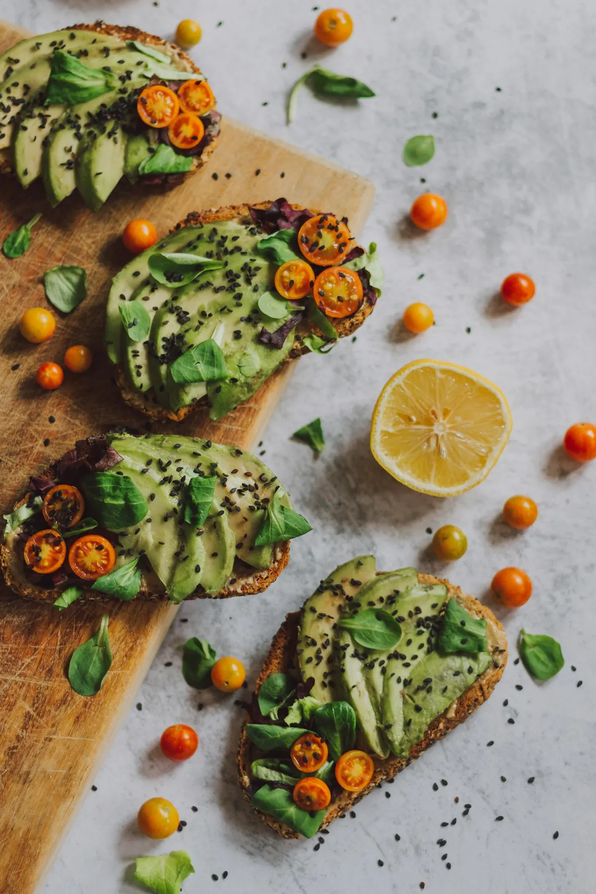 Avocado toast bar with cherry tomatoes and microgreens